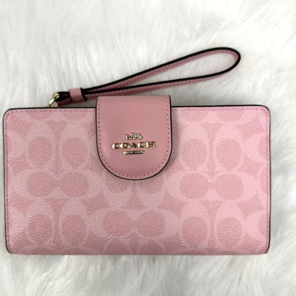 Coach Phone Wallet Wristlet In Signature Canvas In Powder Pink